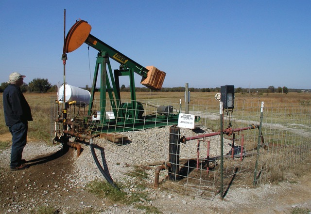 Field trial grounds in Oklahoma with many gas and oil wells in the fields.